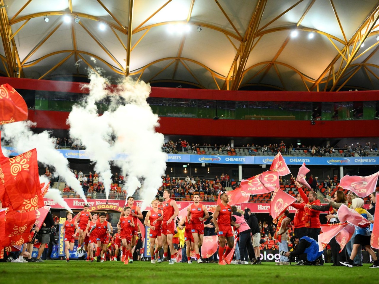 People First Stadium Gold Coast Suns running out onto the field
